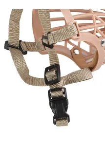 Detail shot of adjustable nylon strap and plastic buckle on a dog basket muzzle