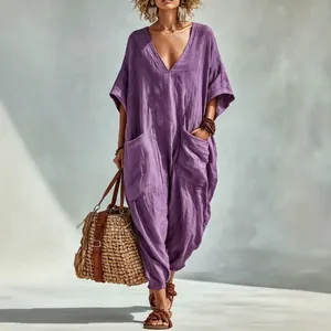 Bohemian loose purple linen jumpsuit with V-neck and large pockets for beach vacation