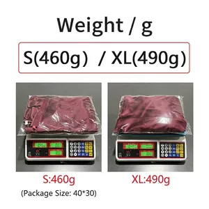 Weight details of burgundy satin mermaid dress for sizes S and XL on electronic scale.