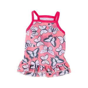 Close-up detail of a pink pet dress featuring a butterfly print and ruffle hem for dogs