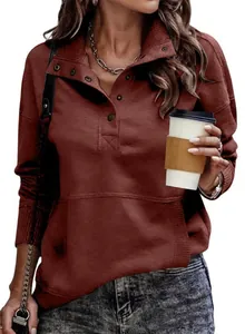 Close-up view of women's casual brown sweatshirt featuring a stand collar and buttons