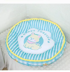 Close-up view of a round summer cooling pet mat with blue stripes and cute dog design.