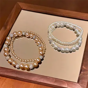 Eleganter doppellagiger Perlenarmband im koreanischen Stil mit Kristallperlenbasis