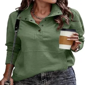 Detailed view of the green stand-up collar sweatshirt with button placket and pocket