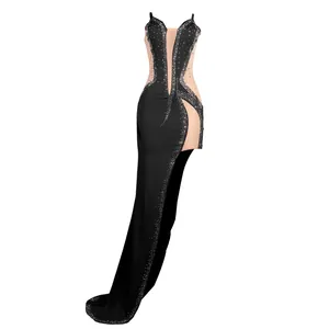 Elegant and sexy black sheer evening gown with sparkling rhinestones and a high split