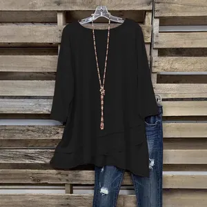 Dames plus size zwart casual topje met driekwart mouwen en asymmetrische gelaagde zoom