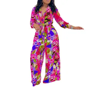 Leuchtendes zweiteiliges Set mit tropischem Blumenmuster, Bindeshirt und weiter Hose