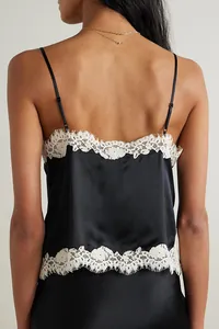 Rear detail of black satin camisole with delicate white eyelash lace trim