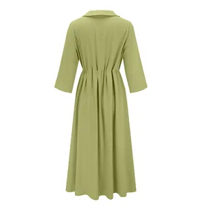 Back view of a casual olive green cotton linen maxi dress with elastic waist detail.