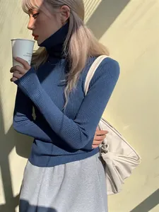 Elegant blue turtleneck ribbed knit sweater with slim fit and long sleeves for women