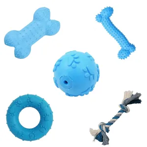 Collection of durable blue dog chew toys including bone, ball, and ring shapes.