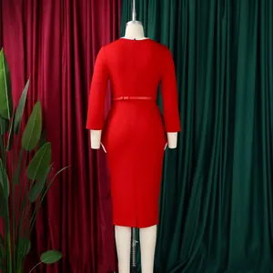 Back view of an elegant professional red long sleeve pencil dress with white peplum detail.