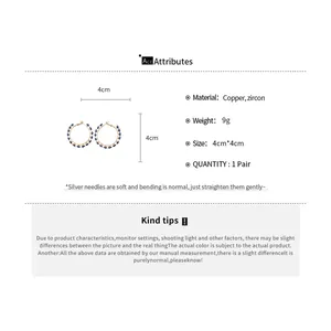Detail view of zircon round hoop earrings with 4cm diameter and product attributes specifications.