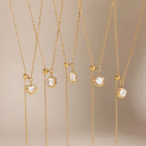 Detailed view of five adjustable 18k gold plated Y-shaped necklaces with zircon pendants