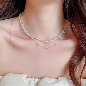 Elegant double-layered vintage French style pearl necklace shown worn by a female model