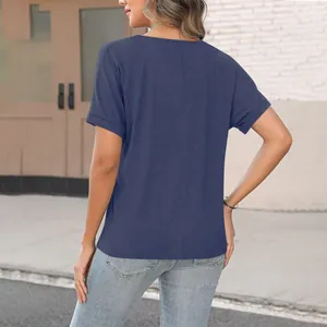 Back view of a casual navy blue short-sleeved T-shirt with vertical center seam