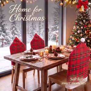 Red plaid Christmas chair covers with white pom-poms in a cozy festive dining room scene