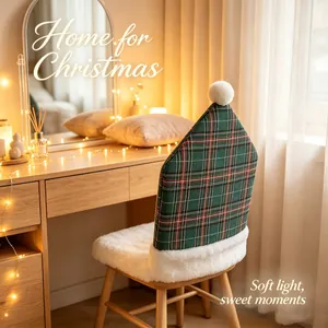 Detailed view of green plaid Christmas chair cover with white pom-pom in cozy home