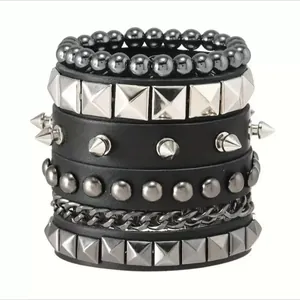 Punk style multi-layer black leather bracelet set with silver spikes and metallic studs