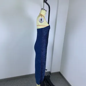Side view of a blue sparkling high-stretch knit bodycon dress with side fringe detail.