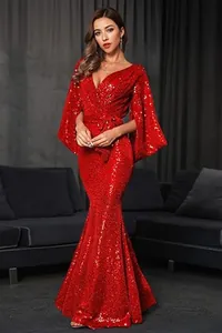 Elegant red sequined mermaid evening gown with flared cape sleeves and deep V-neckline