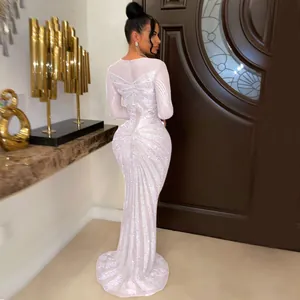 Back view of elegant floor-length evening dress with glittering silver rhinestones