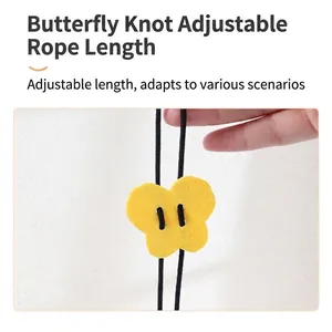 Adjustable hanging cat toy with yellow butterfly felt slide and black cord