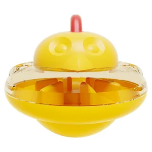 Interactive yellow chicken tumbler slow feeder toy for pet cats and dogs to relieve boredom