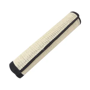 Natural sisal cat scratch mat furniture protector rolled for desk leg protection.