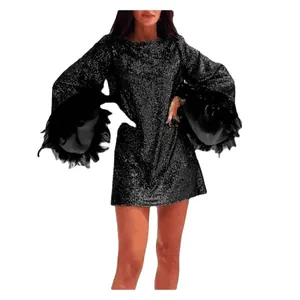 Elegant black sequin long sleeve mini dress with feather trim bell sleeves for party wear.