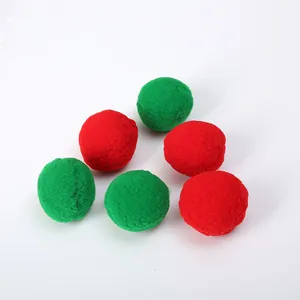 Six soft Christmas themed red and green plush pompom balls for cat interactive chase play