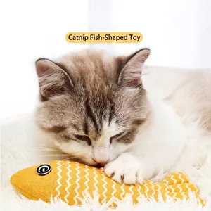 Interactive yellow fish-shaped catnip toy for cats teeth grinding and entertaining play
