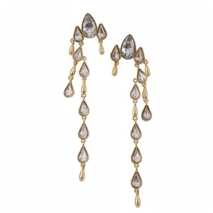 Elegantes pendientes de gota de cristal dorado con un diseño geométrico muy brillante