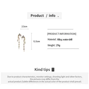Detalle de pendientes borla gota de cristal con info de talla y material