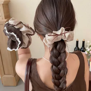 Retro polka dot scrunchie set for women featuring beige and brown vintage hair rings.