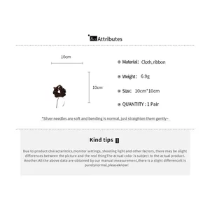 Detail view showing brown scrunchie dimensions, cloth material and weight attributes.