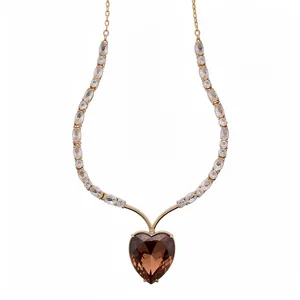 Elegant gold-plated heart pendant necklace with brown crystal and sparkling zircon stones.