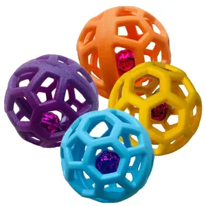 Colorful set of durable TPR hollow bell balls for dog molar training and fun play.