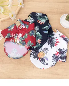 Close-up detail of tropical pineapple print Hawaiian pet shirts for dogs in multiple colors