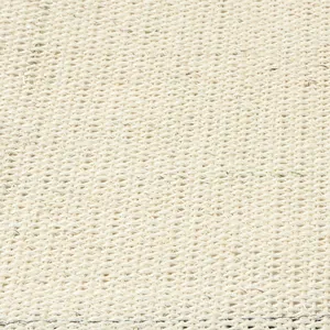 Macro texture detail of natural beige woven sisal cat scratching mat material fabric