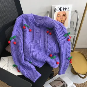 Stylish purple chunky knit cardigan featuring vibrant 3D cherry appliques and loose fit design