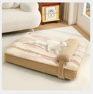 Close-up of soft plush pet bed sofa with integrated pillow for cats and small dogs