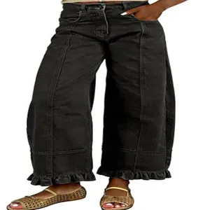 High-waisted vintage washed black wide leg denim pants with elegant ruffled hem