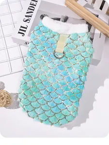 Detail of teal gradient mermaid scale pet vest with white fur collar and harness D-ring