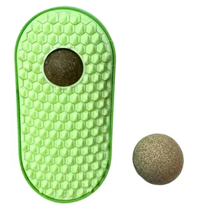 Pea-shaped cat self-groomer toy with silvervine catnip ball for massage.