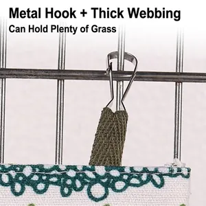 Hanging pet hay feeder bag featuring a durable metal hook and reinforced webbing strap