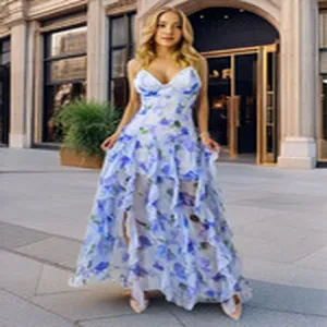 Elegant blue and white floral organza maxi dress featuring ruffles and a layered skirt design.