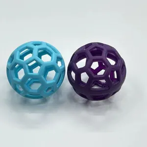 Durable TPR hollow lattice balls for dog chewing and training in cyan and purple color