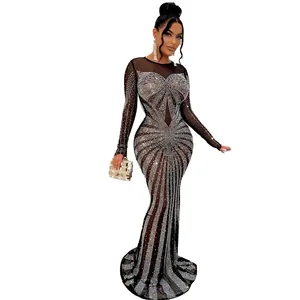 Detailed view of sexy floor-length black mesh dress with sparkling silver rhinestones