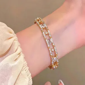 Elegant 18k gold plated bracelet featuring sparkling oval zircons for a luxury look